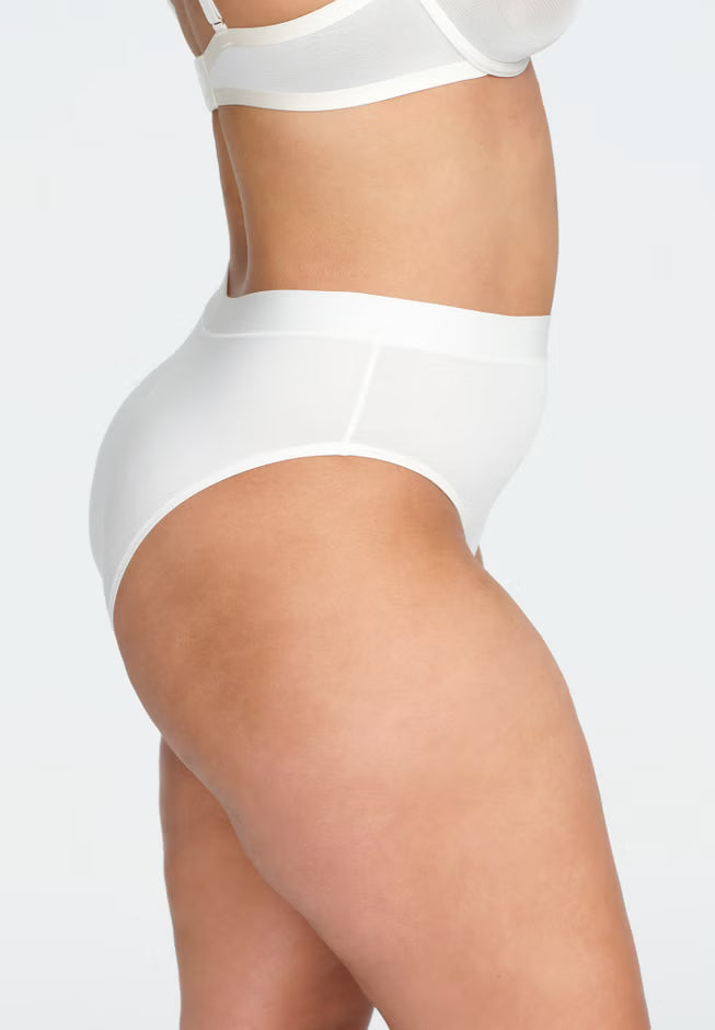 High‑rise modal brief in neutral tone; high‑cut leg, antimicrobial bamboo gusset, no‑dent high‑stretch waistband, butter‑soft texture.