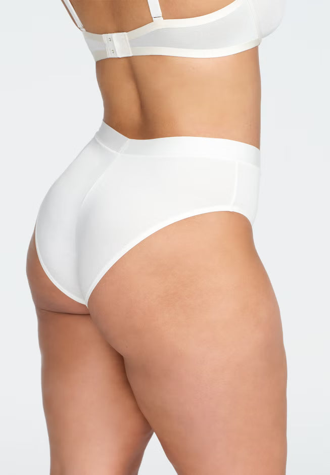 High‑rise modal brief in neutral tone; high‑cut leg, antimicrobial bamboo gusset, no‑dent high‑stretch waistband, butter‑soft texture.