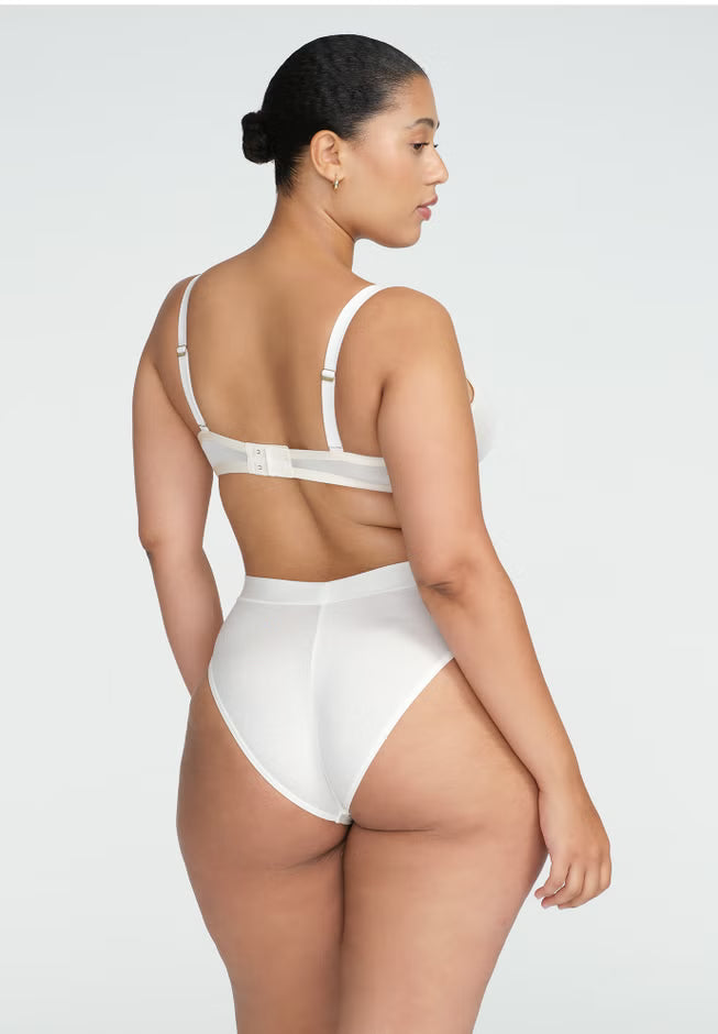 High‑rise modal brief in neutral tone; high‑cut leg, antimicrobial bamboo gusset, no‑dent high‑stretch waistband, butter‑soft texture.