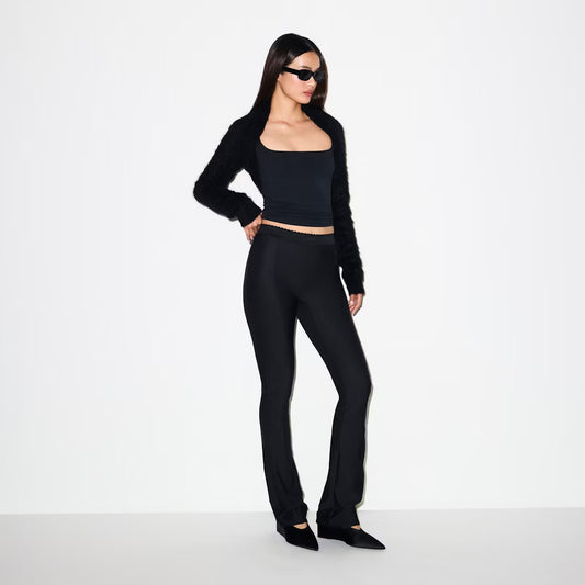 Premium alpaca blend crewneck sweater, brushed finish, ribbed details, modern long sleeves, elevated luxury for women.