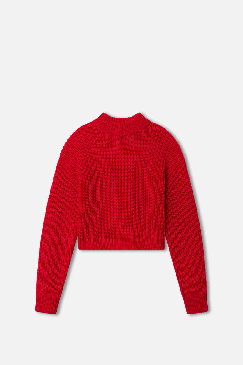 Red sweater on a light gray background