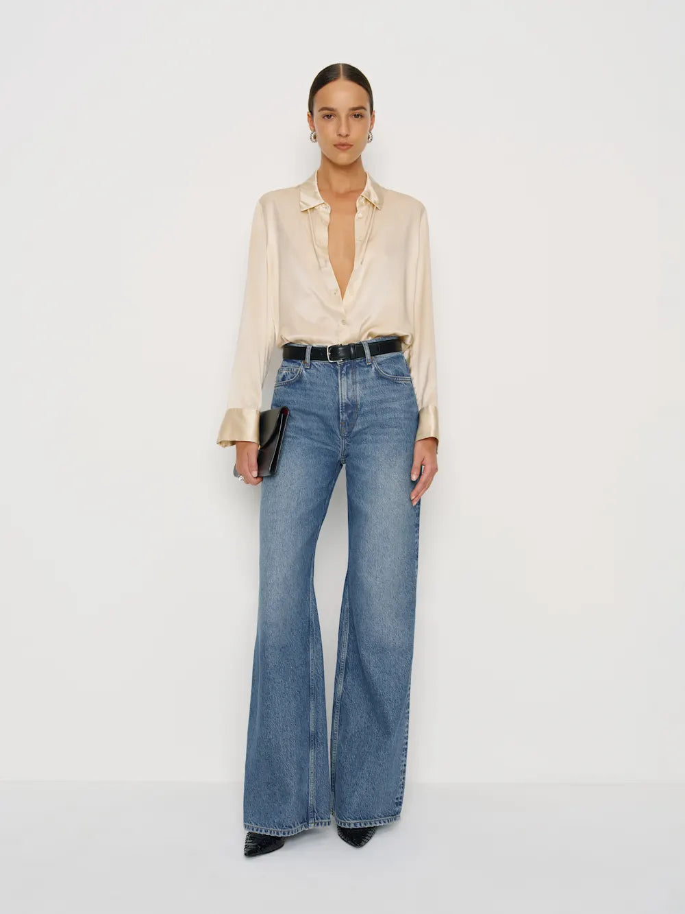 Cary High Rise Slouchy Wide Leg Jeans in rigid denim — natural waist, full-length inseam, wide leg opening, worn by executive woman in urban setting, Lux & Motion Editor’s Vault