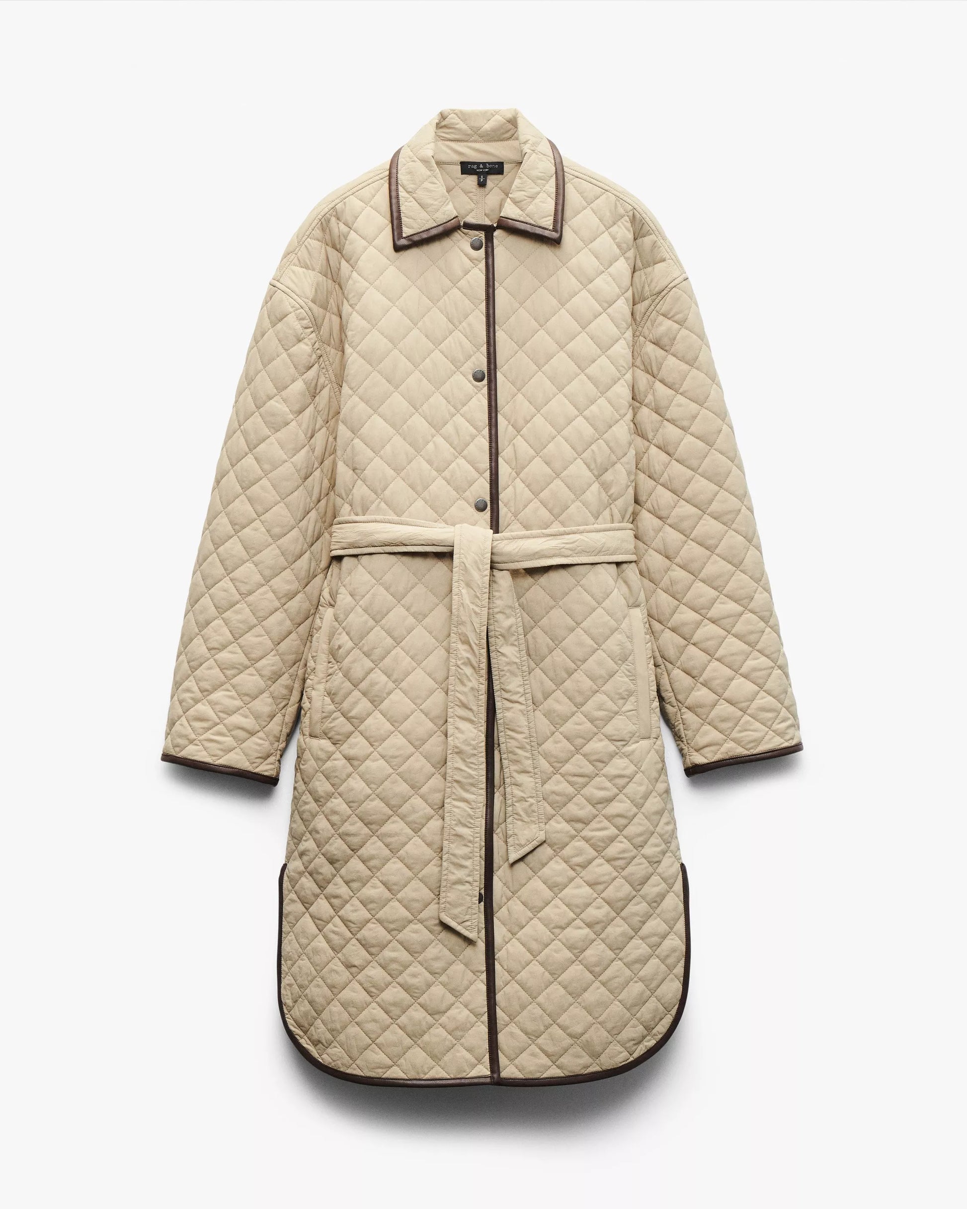Beige quilted coat with a belt on a white background