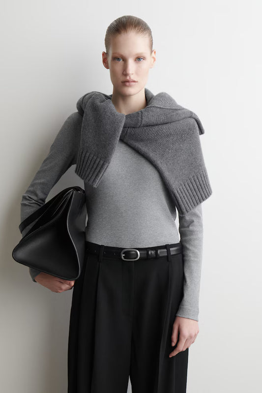 Sovereign woman in gray ribbed long-sleeve top - silent authority in modern workspace - Lux & Motion core uniform essential
