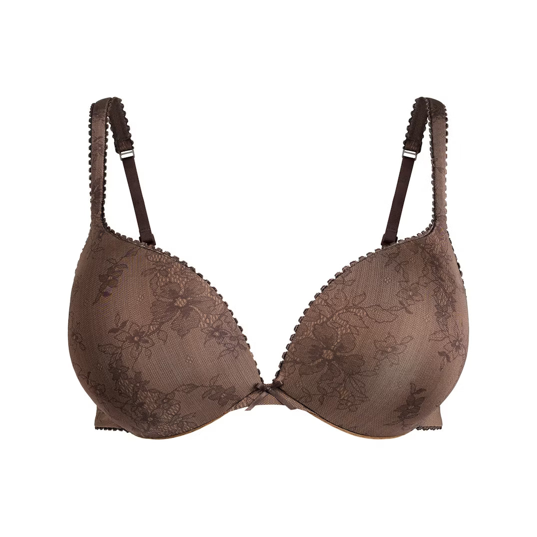 Brown bra with floral lace details on a white background