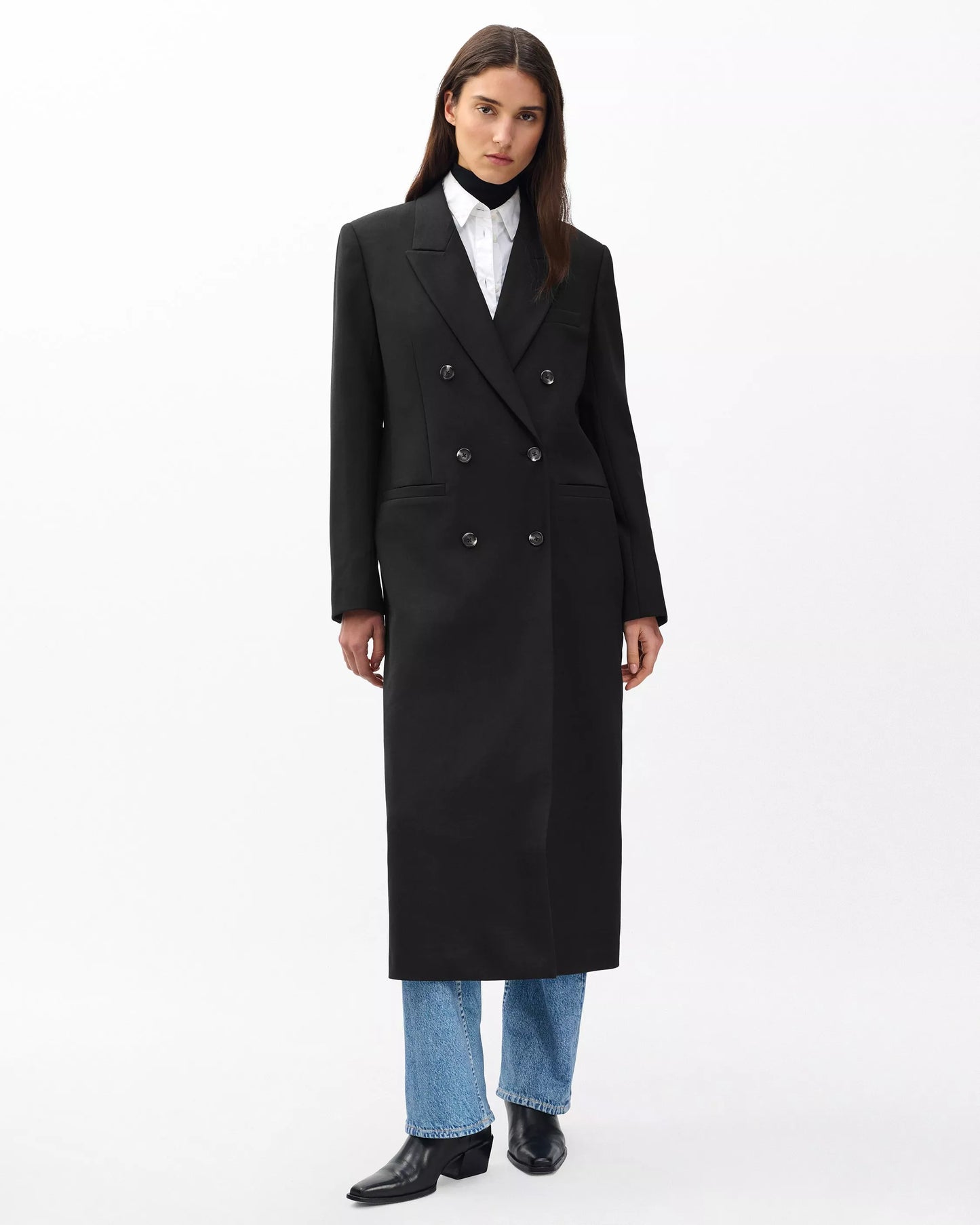 Woman wearing Vienna Coat by Lux & Motion | Italian wool blend trench coat for executives | Relaxed silhouette | Foundation 2025 Collection