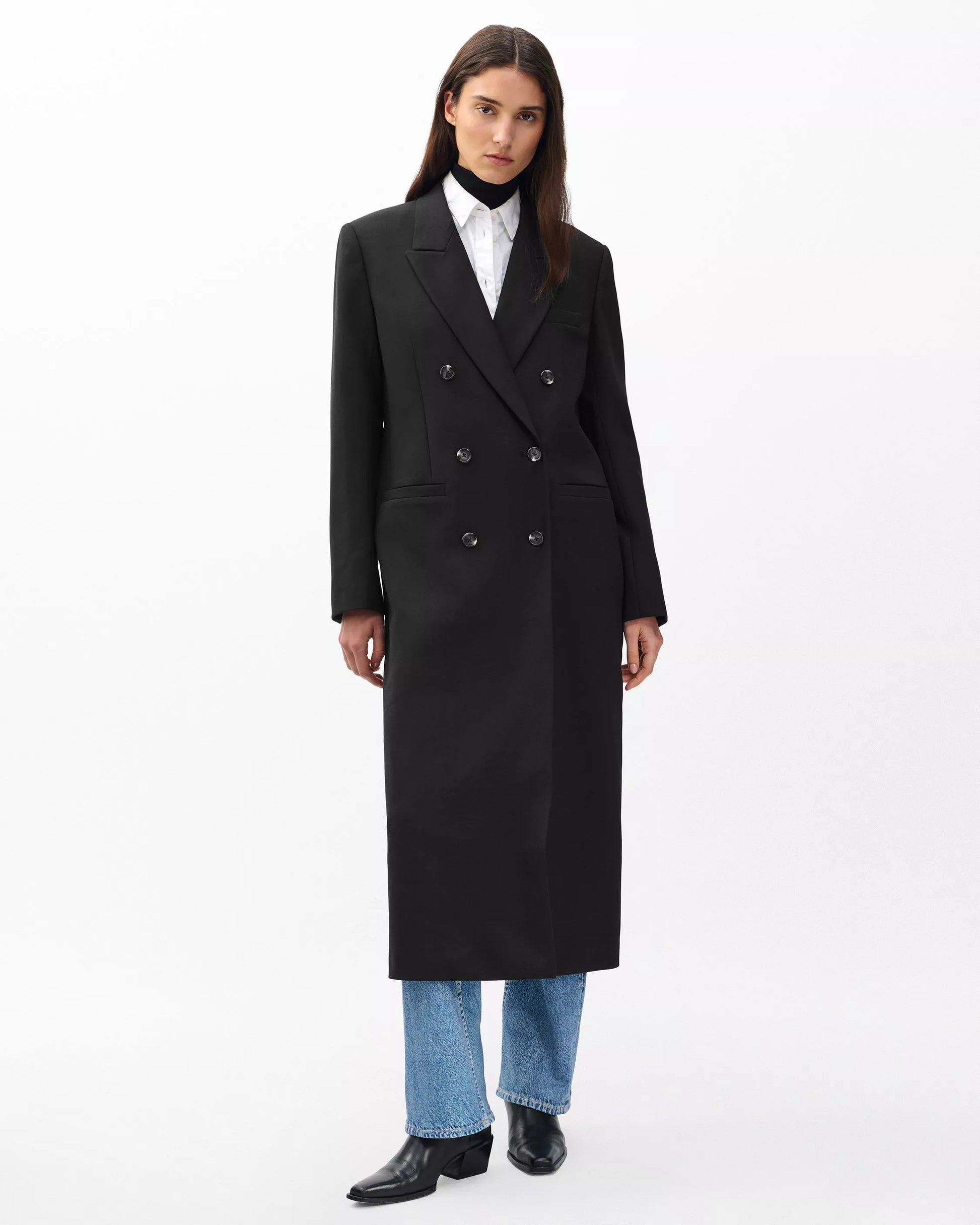 Woman wearing Vienna Coat by Lux & Motion | Italian wool blend trench coat for executives | Relaxed silhouette | Foundation 2025 Collection