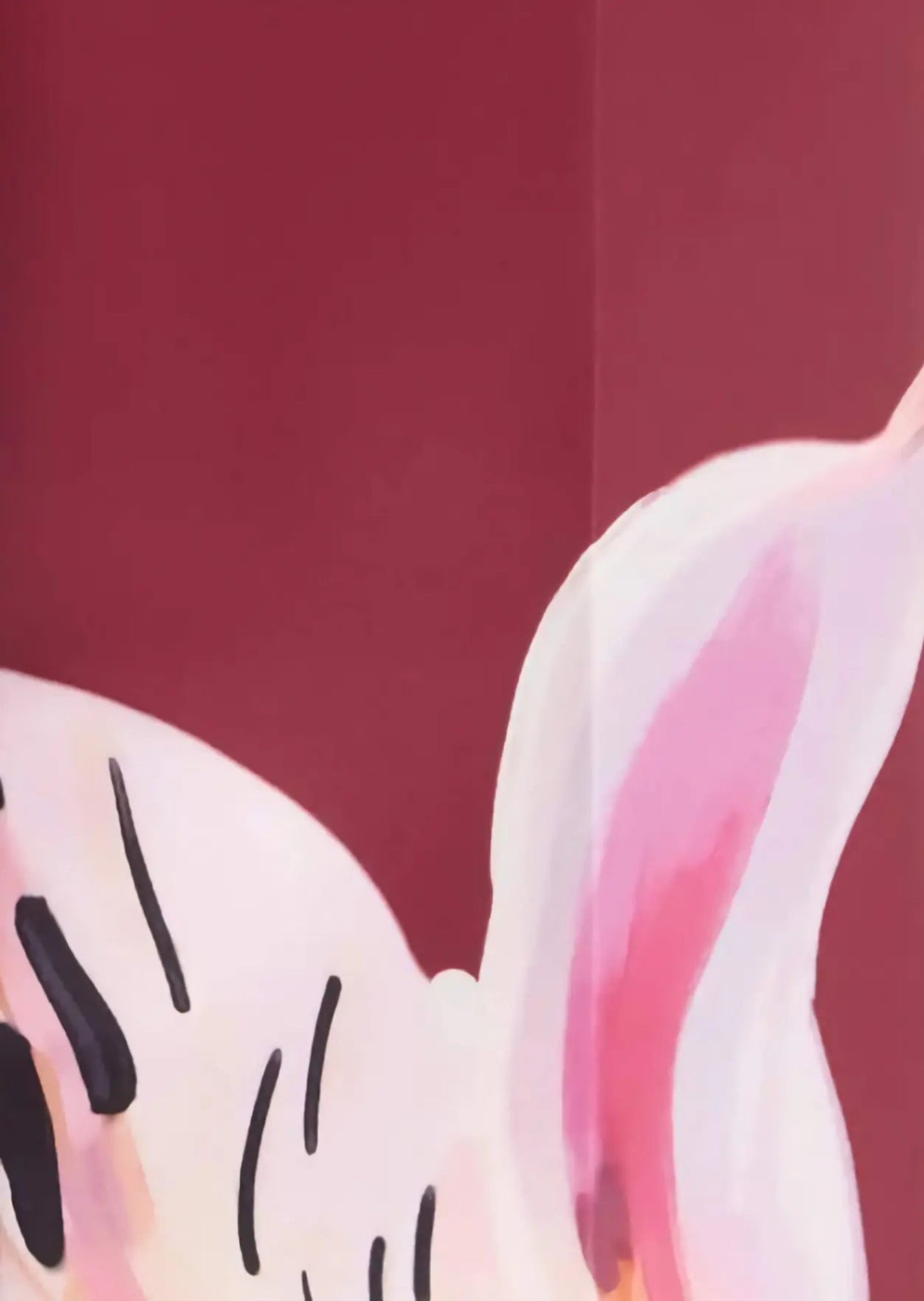 Cartoon character with pink and white ears on a red background