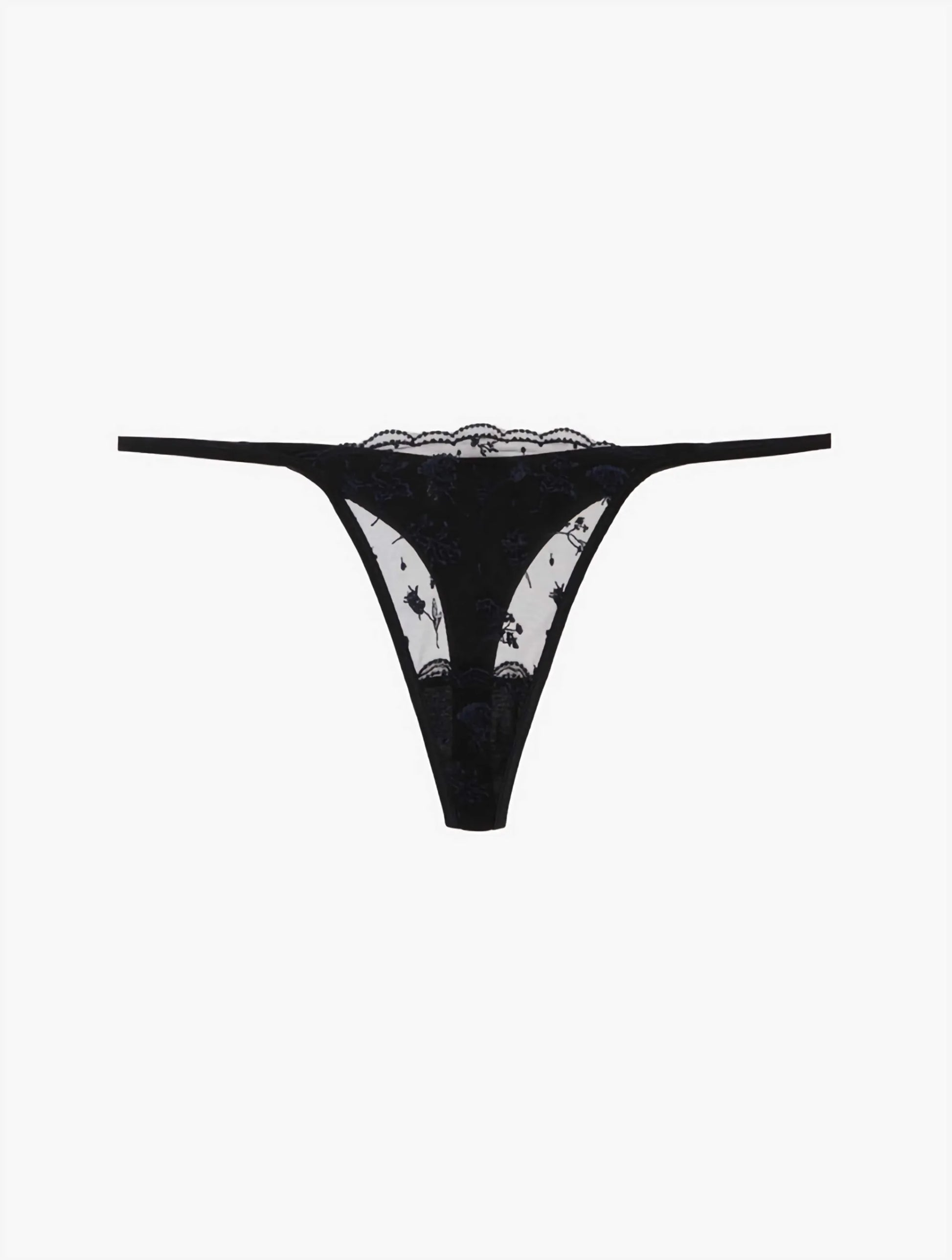 The Midnight Botanica Thong in onyx black, showcasing the delicate floral embroidery on sheer tulle and its minimalist silhouette.