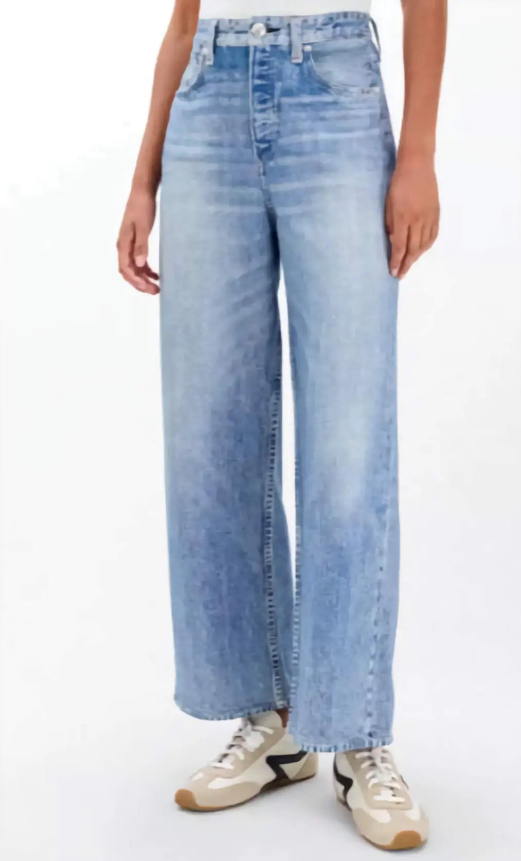 Light blue jeans worn by a person on a white background