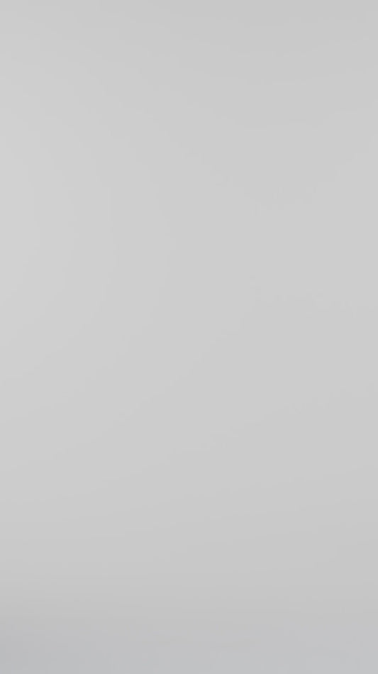 AVA signature print cardigan with striped cuffs and geometric pattern by Lux and Motion