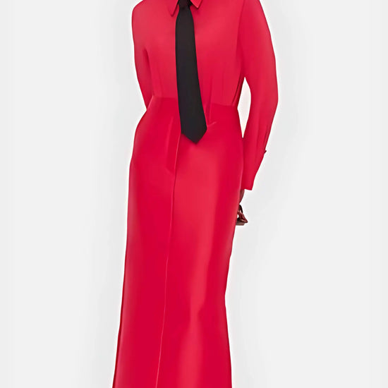 The Eve Maxi Skirt in soft Rosa, showcasing the high-rise waist and fluid drape on a model, highlighting its elongated silhouette.