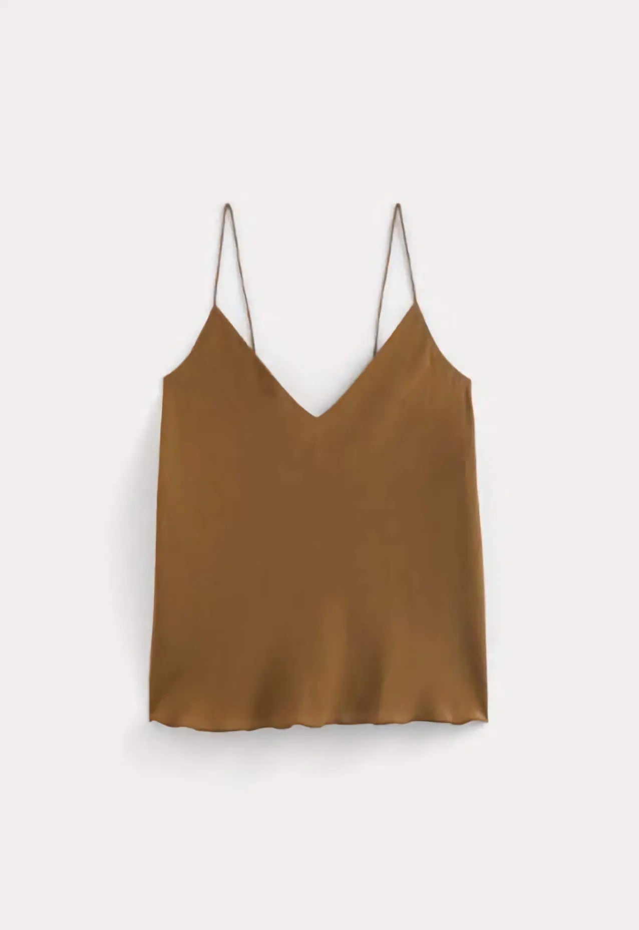 The Tie Back Cami in black clean silk, showcasing the adjustable tie-back and fluid drape on a model, emphasizing its sustainable elegance