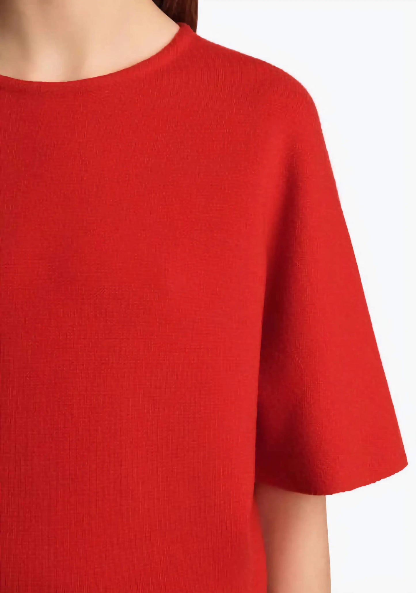 Red sweater with short sleeves on a white background